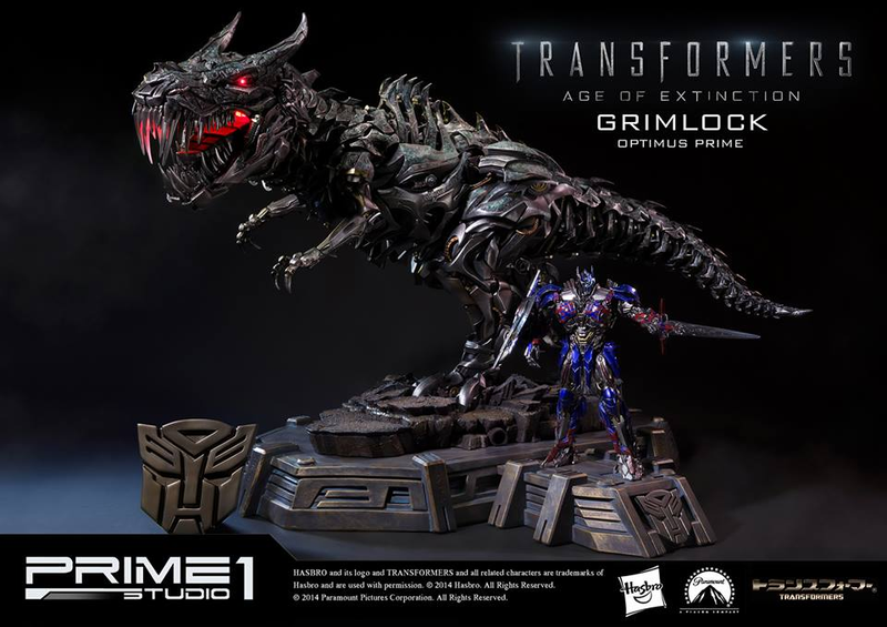Illustration for article titled Glorious Grimlock and Optimus Prime Statue
